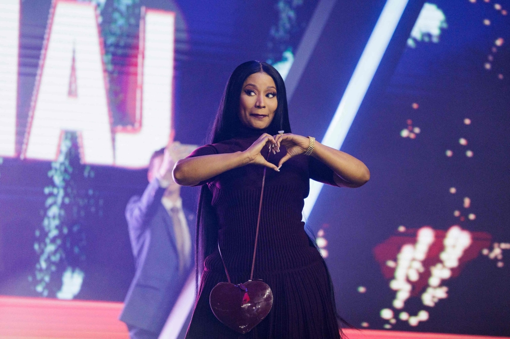 Nicki Minaj enters the stage as the surprise guest on the final day of Turning Point USA's annual AmericaFest conference at the Phoenix Convention Center December 21, 2025 in Phoenix, Arizona. — AFP