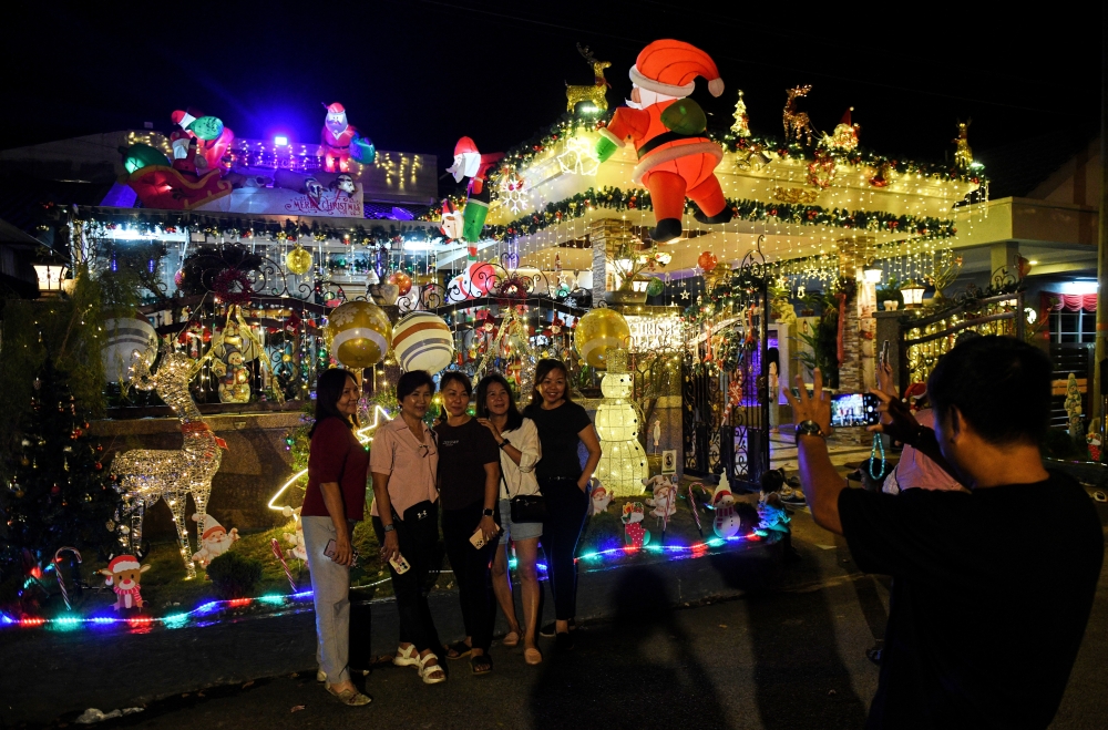 Colourful Christmas lights and festive displays at a home in Taman Teluk Molek, Teluk Air Tawar have turned the residence of D. Charles and S. Christe, into a public attraction, welcoming visitors since early December. — Bernama photo (2025)