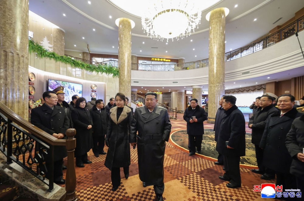This picture taken on December 20, 2025 and released by North Korea's official Korean Central News Agency (KCNA) via KNS on December 23, 2025 shows North Korean leader Kim Jong Un (C) and his daughter Ju Ae (to his L) inspecting the Ikkal Hotel, which was recently completed in the Samjiyon tourist district of Ryanggang Province. — AFP pic