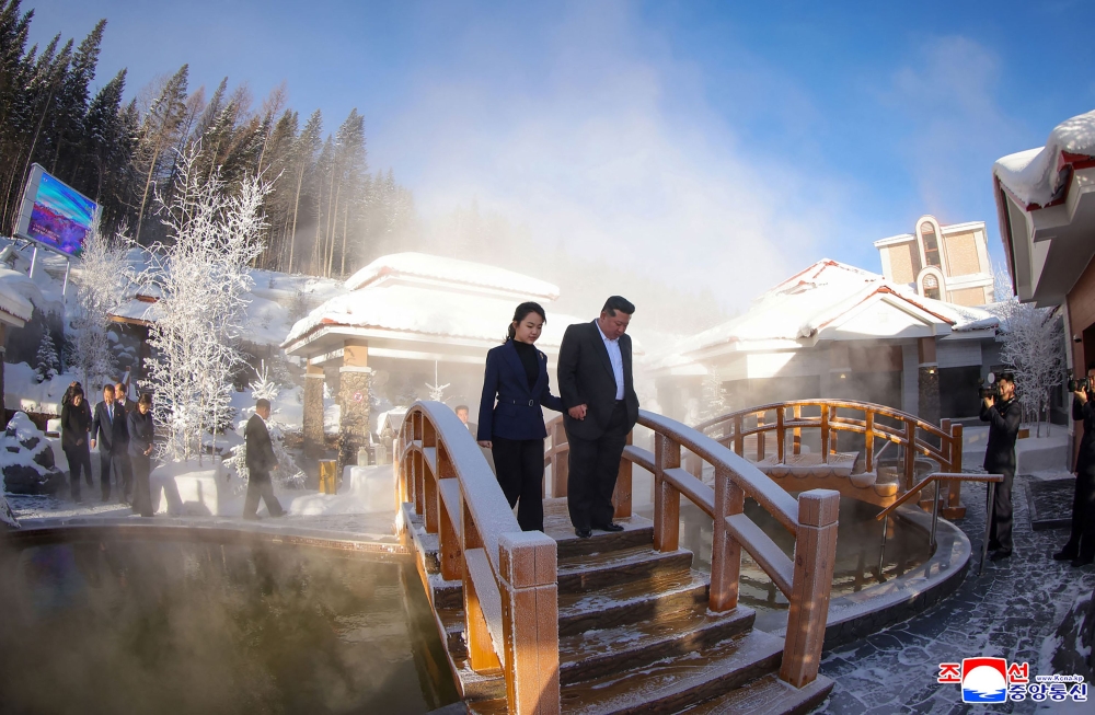 This picture taken on December 20, 2025 and released by North Korea's official Korean Central News Agency (KCNA) via KNS on December 23, 2025 shows North Korean leader Kim Jong Un (R) and his daughter Ju Ae (L) inspecting the Milyong Hotel, which was recently completed in the Samjiyon tourist district of Ryanggang Province. — AFP pic