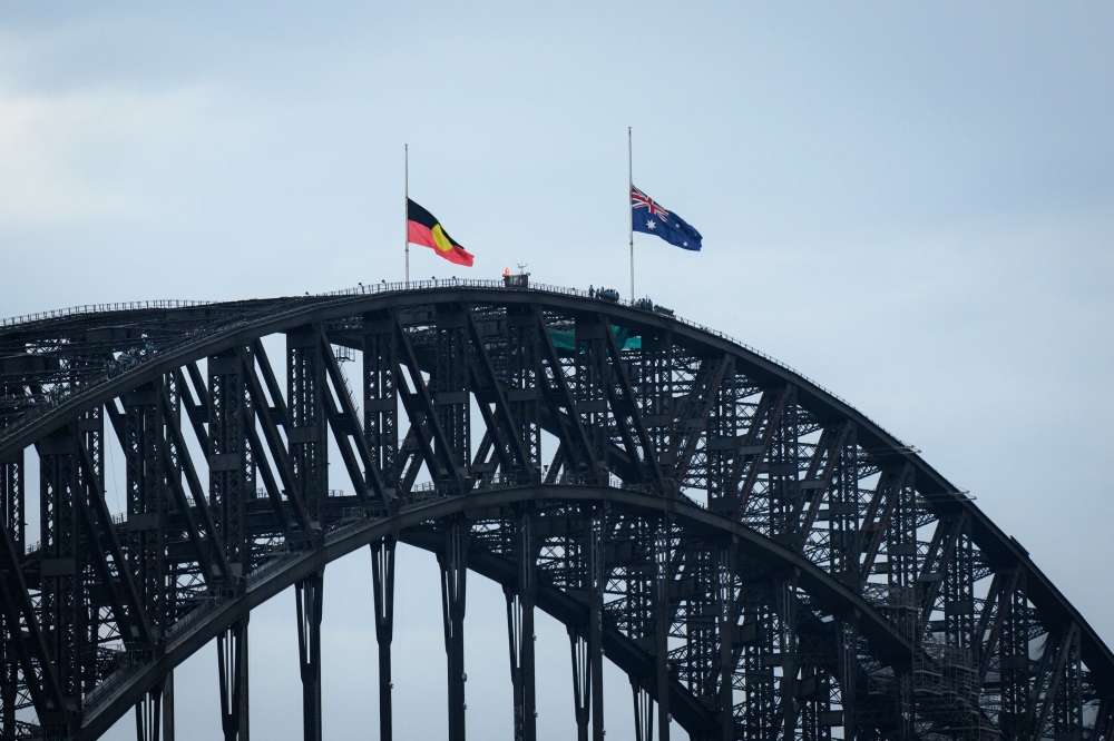 Australia cancels visa of Briton accused of displaying Nazi symbol, inciting hate