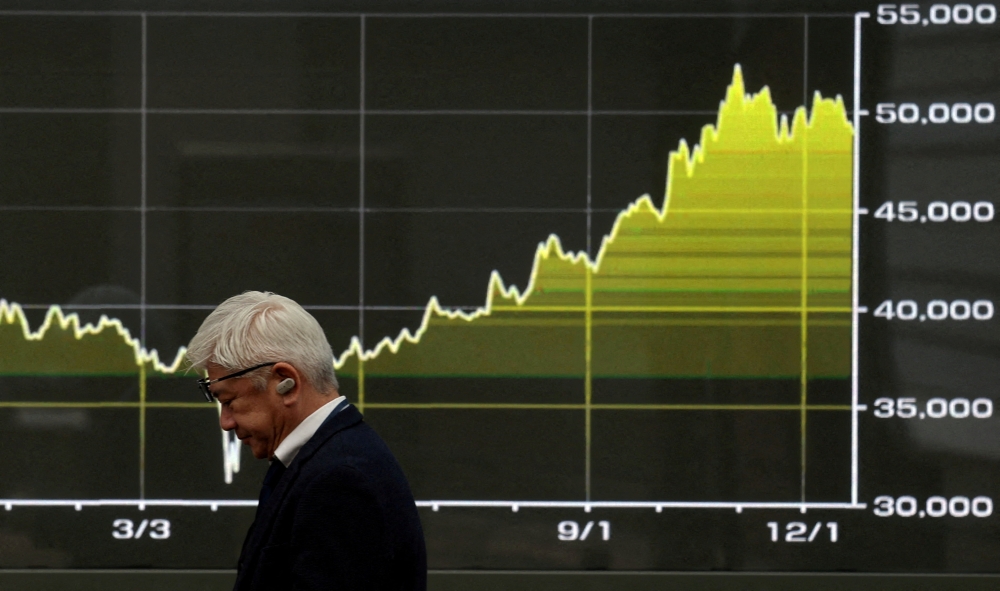 Asian markets mostly higher after US GDP fuels Wall Street rally