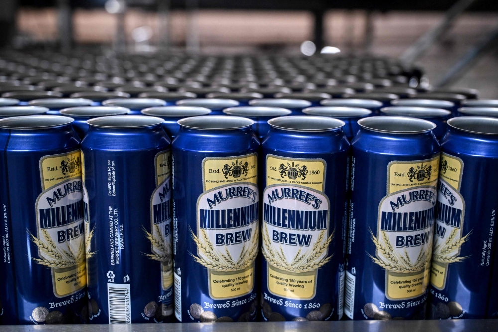 A heady aroma of malt and brewing yeast drifts through Pakistan’s oldest and by far largest brewery, which is gearing up for expansion after getting approval to sell abroad after a nearly 50-year ban. — AFP pic