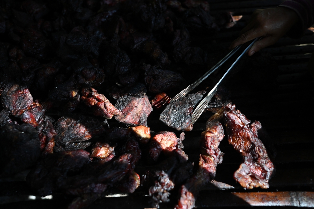 Smoked buffalo from Kampung Belimbing has become a favourite for ‘masak lemak’, ‘rendang’ and ‘sambal’ dishes. — Bernama pic
