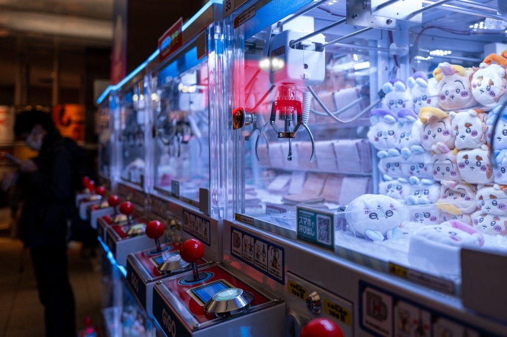 Stuffed toys are seen inside claw crane game machines inside a shop at Tokyo’s Shinjuku district November 22, 2025. — AFP pic