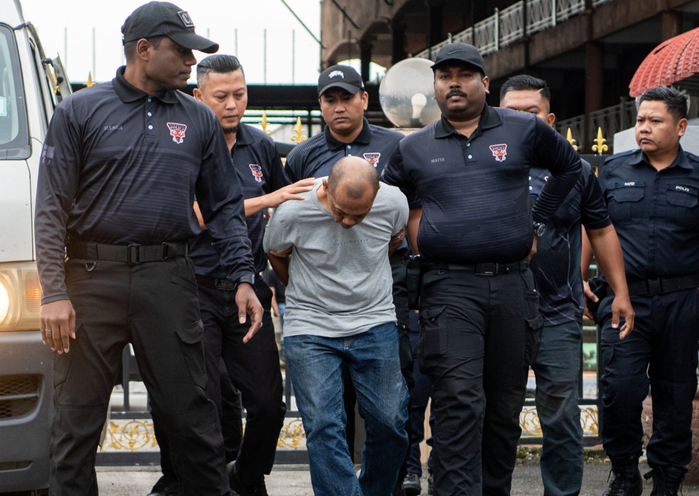 The suspect was charged under Section 302 of the Penal Code, which carries a death sentence or imprisonment of between 30 and 40 years. — Bernama pic