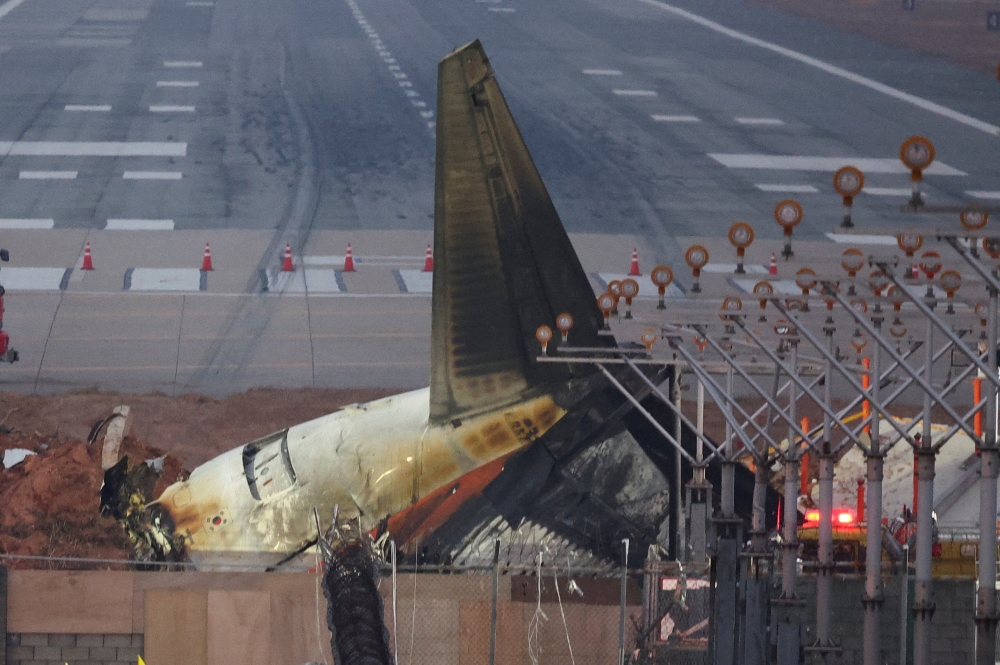 The wreckage of the Jeju Air aircraft that went off the runway and crashed lies at Muan International Airport, in Muan, South Korea, December 30, 2024. — Reuters pic