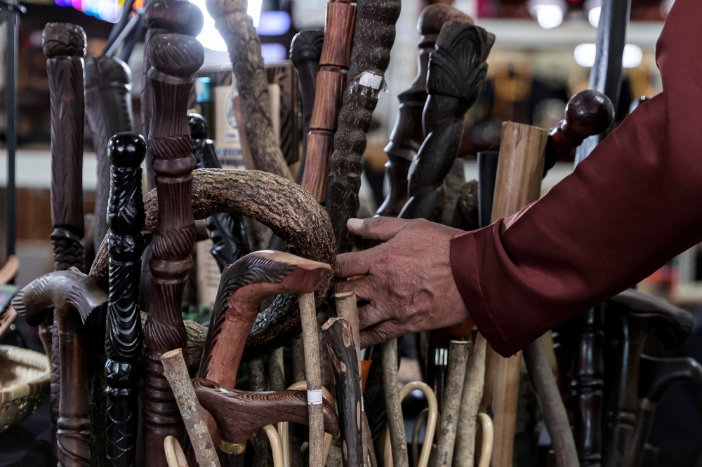 Crafted from forest wood, the items on display reflect a blend of heritage, craftsmanship and Islamic healing traditions. — Bernama pic