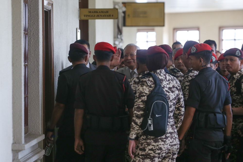 Former prime minister Datuk Seri Najib Razak leaves the Kuala Lumpur High Court Complex on December 22, 2025. — Picture by Yusof Isa