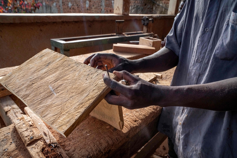 A man works in a workshop training former child soldiers in Bunia, DR Congo, on December 8, 2025. — AFP pic