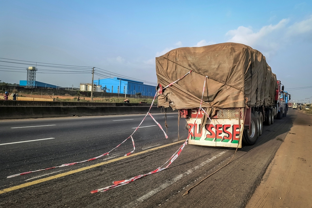 A damaged 18-wheeler involved in a fatal crash with British boxer Anthony Joshua is towed on the Lagos-Ibadan Expressway near Sagamu, Nigeria on December 29, 2025. — AFP pic