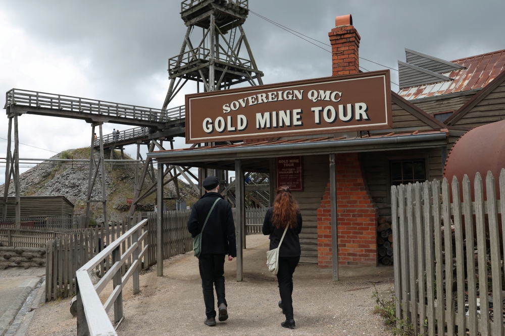 People enter a gold mine tour at Sovereign Hill, an outdoor living museum set in the Gold Rush era, in Ballarat, Australia, November 30, 2025. — Reuters pic