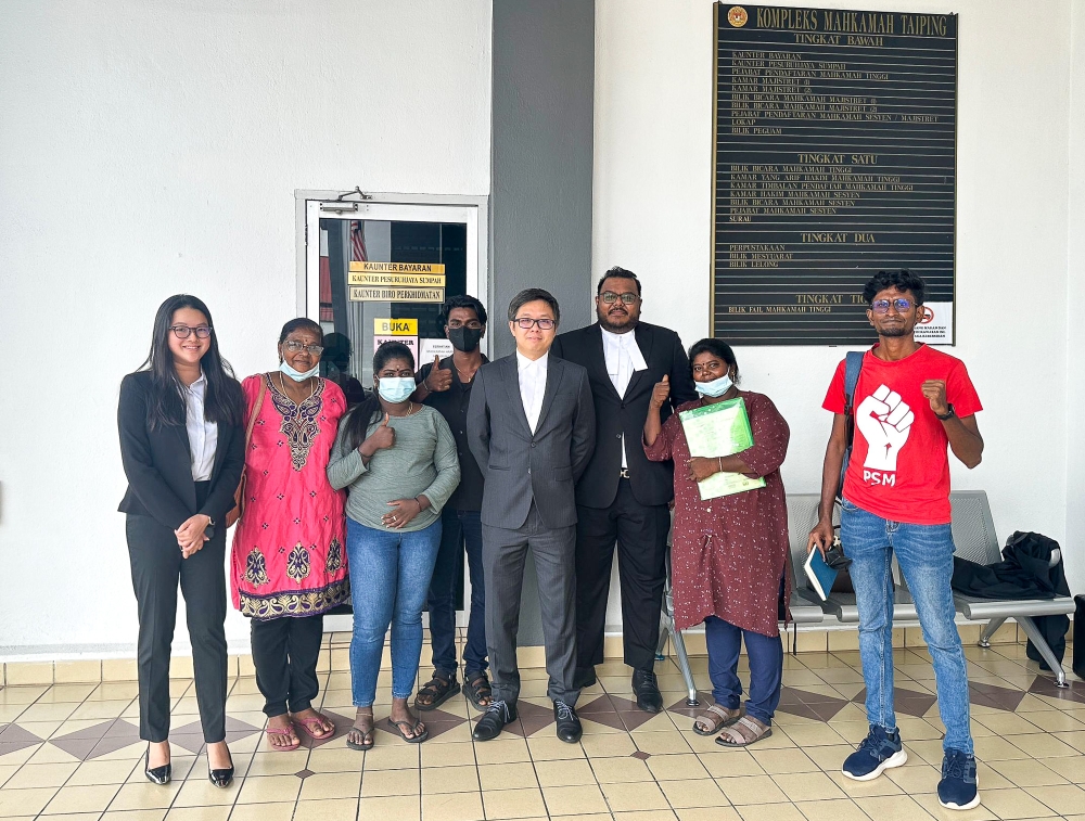 (From left) Kamaladevi’s two children T (in grey), M (in black), lawyer New Sin Yew, lawyer Shugan Raman, Kamaladevi Kanniappan as seen at the Taiping, Perak court complex . May 20, 2024. Picture courtesy of lawyers