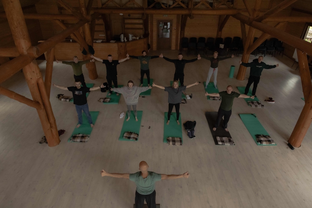 Ukrainian military medics attend a yoga session at the RePower programme, a mountain retreat designed to support their psychological recovery and mental well-being in Ukraine's western Zakarpattia region on October 23, 2025, amid the Russian invasion of Ukraine. — AFP pic