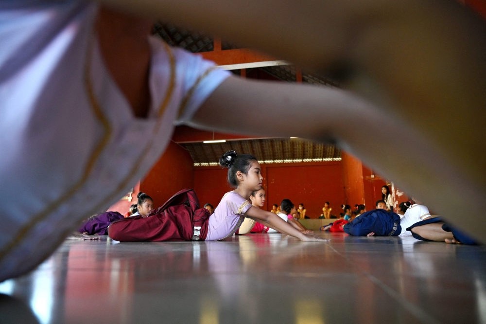 This photo taken on December 1, 2025 shows Cambodian students during dance practice at the Secondary School of Fine Arts in Phnom Penh. — AFP pic 