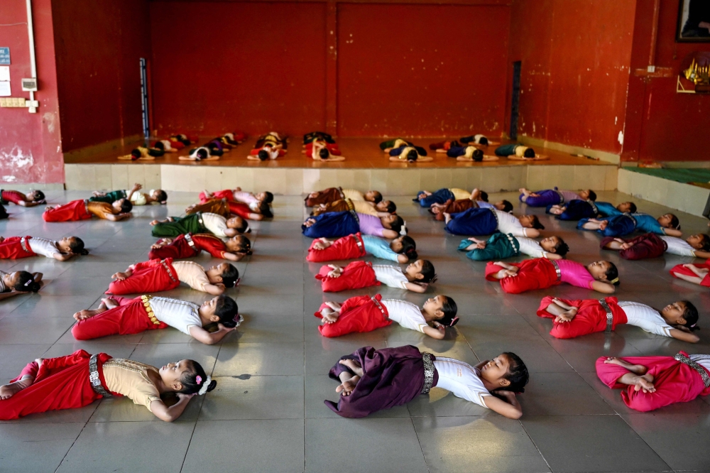 This photo taken on December 1, 2025 shows Cambodian students during dance practice at the Secondary School of Fine Arts in Phnom Penh.  — AFP pic 