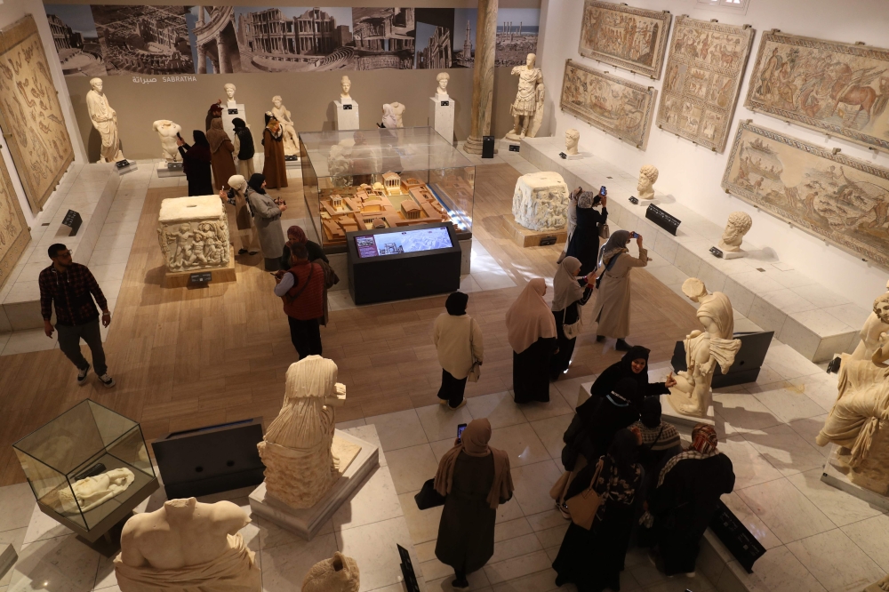  Libyans visit the National Museum after its reopening, following a closure of more than a decade in the Libyan capital Tripoli on December 23, 2025. In a historic building in central Tripoli, Libyans wander past ancient statues and artefacts, rediscovering a heritage that transcends political divides at their national museum which reopened this month after a 2011 uprising. — AFP pic 