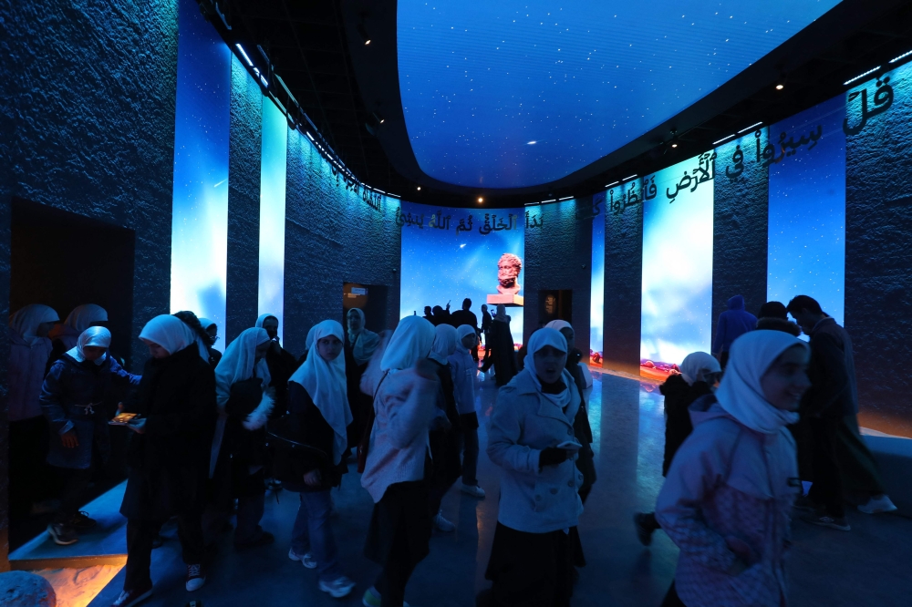 Libyan students visit the National Museum after its reopening, following a closure of more than a decade in the Libyan capital Tripoli on December 23, 2025. — AFP pic