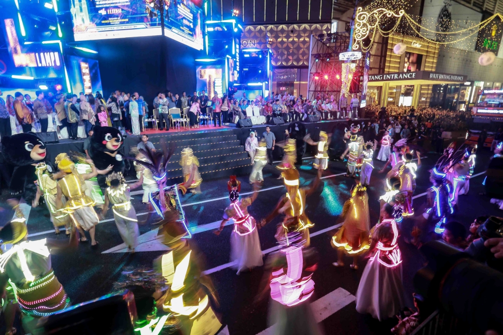 Prime Minister Datuk Seri Anwar Ibrahim along with the VIPs looks on as dancers perform during the Lighting Innovation Project Towards Urban Sustainability launch at Pavillion Kuala Lumpur January 3, 2026. — Picture by Sayuti Zainudin