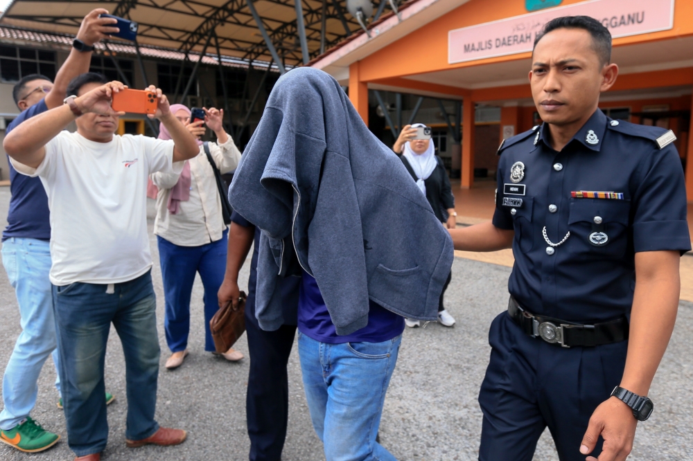 The suspect is brought to the Kuala Berang Magistrate’s Court January 4, 2026. — Bernama pic