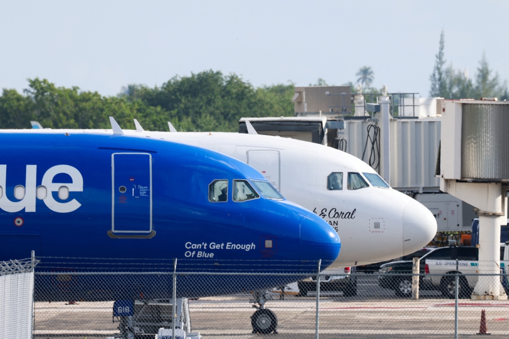Even after the removal of curbs, however, airlines will need several days to restore normal operations. — Reuters pic