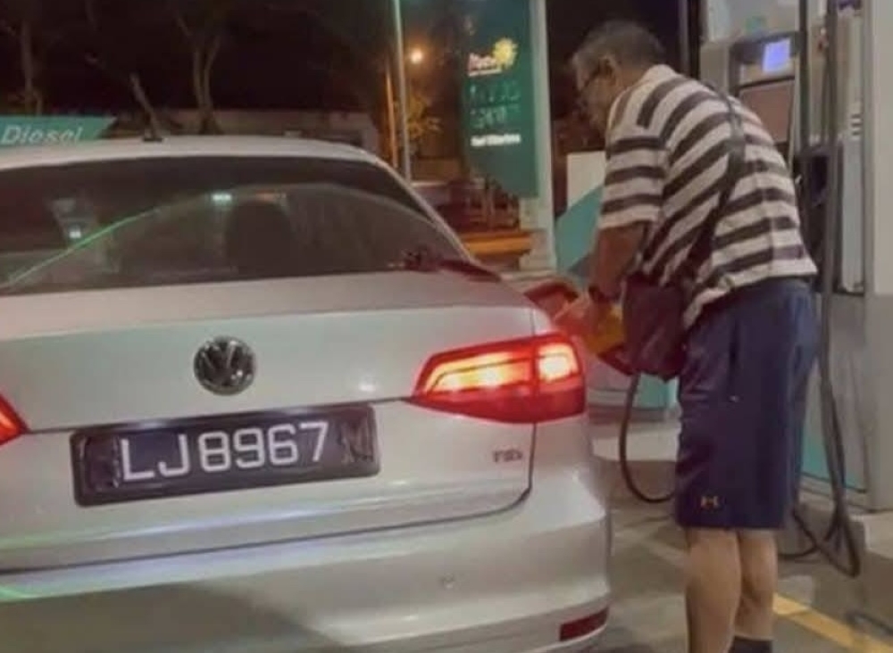 A video circulating on social media shows a Singapore-registered vehicle refuelling RON95 petrol, with part of the number plate obscured.