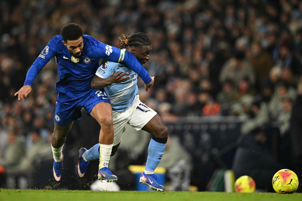 Manchester City’s Premier League title challenge suffered a huge setback as managerless Chelsea salvaged a dramatic 1-1 draw. — AFP pic