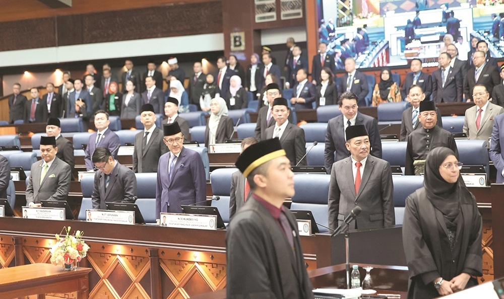 Datuk Seri Hajiji Noor and other elected representatives during the swearing-in ceremony last December 11. — Daily Express pic
