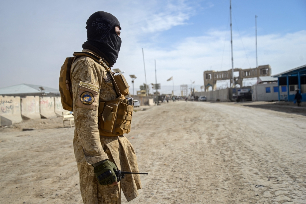 A Taliban security personnel stands guard near the zero-point border crossing between Afghanistan and Pakistan in the Spin Boldak district on December 29, 2025. — AFP pic
