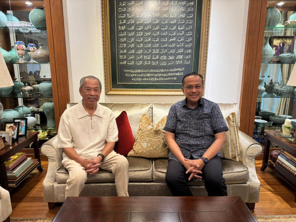 Former Perikatan Nasional chairman Tan Sri Muhyiddin Yassin meets Terengganu Menteri Besar Datuk Seri Dr Ahmad Samsuri Mokhtar in a photograph shared on Facebook by Bachok MP Mohd Syahir Che Sulaiman.