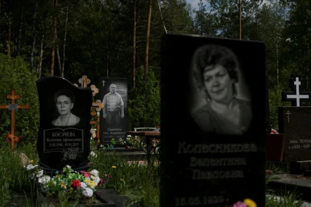 Why millions of Russian graves lie abandoned — and the family bringing ...