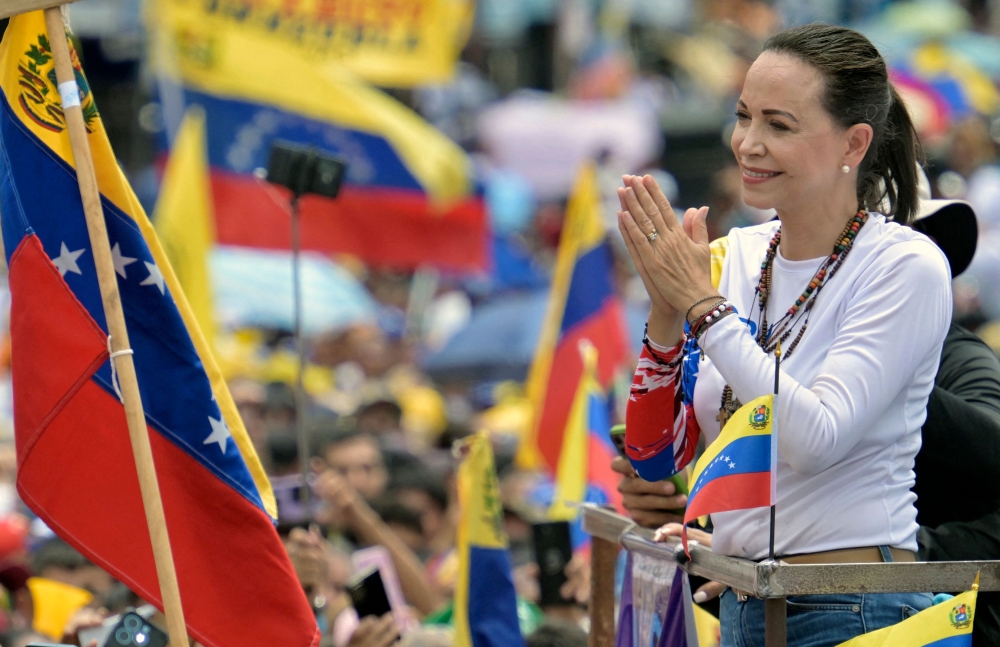 File picture shows Venezuelan opposition leader Maria Corina Machado gesturing during a campaign rally of presidential candidate Edmundo Gonzalez, in Barinas, Venezuela, on July 6, 2024. — AFP pic