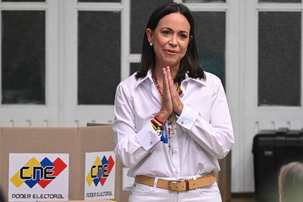 Venezuelan opposition leader Machado vows swift return as she rejects interim leader after Maduro ouster