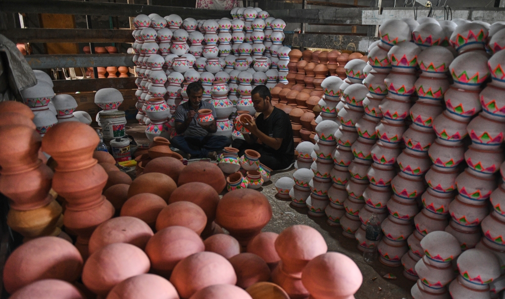 With nine workers by his side, Reguraj’s clay pots reach customers and suppliers across Malaysia. — Bernama pic