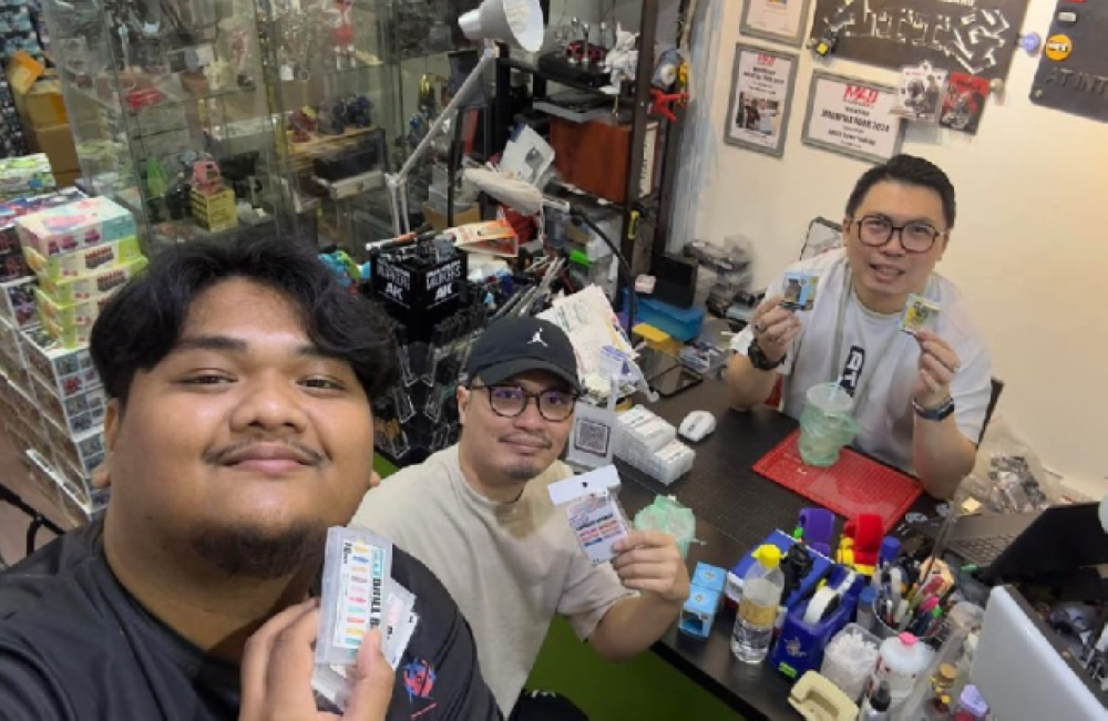 Raja Mohd Azreen Raja Azahan (middle) said his journey into the world of art toys began unexpectedly during the Covid-19 pandemic.— Bernama pic