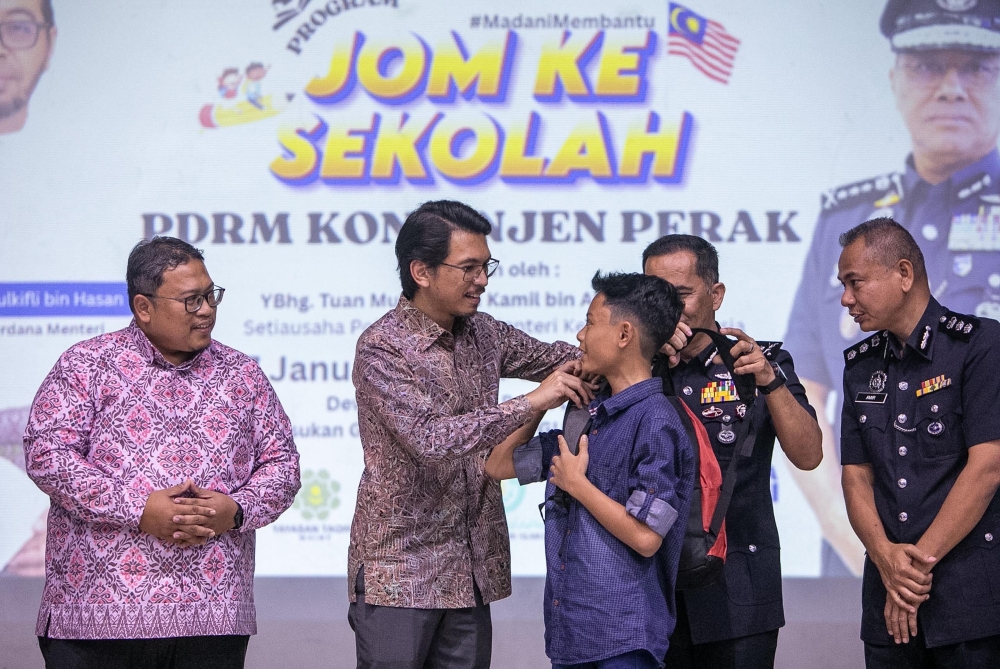 Political Secretary to the Prime Minister and Finance Minister, Muhammad Kamil Abdul Munim attended the Back to School 2026 Perak PDRM Contingent Programme at Pengkalan PGU in Ipoh, Perak. — Picture courtesy of Muhammad Kamil’s media unit. 