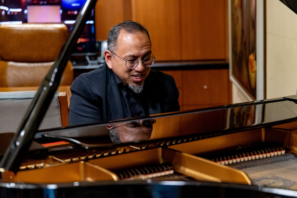 Ahmad Muriz Che Rose will be leading around 65 members of the MPO during the P.Ramlee's ‘Madu Tiga: Live in Concert’ this January 23 and January 24. — Picture by Firdaus Latif