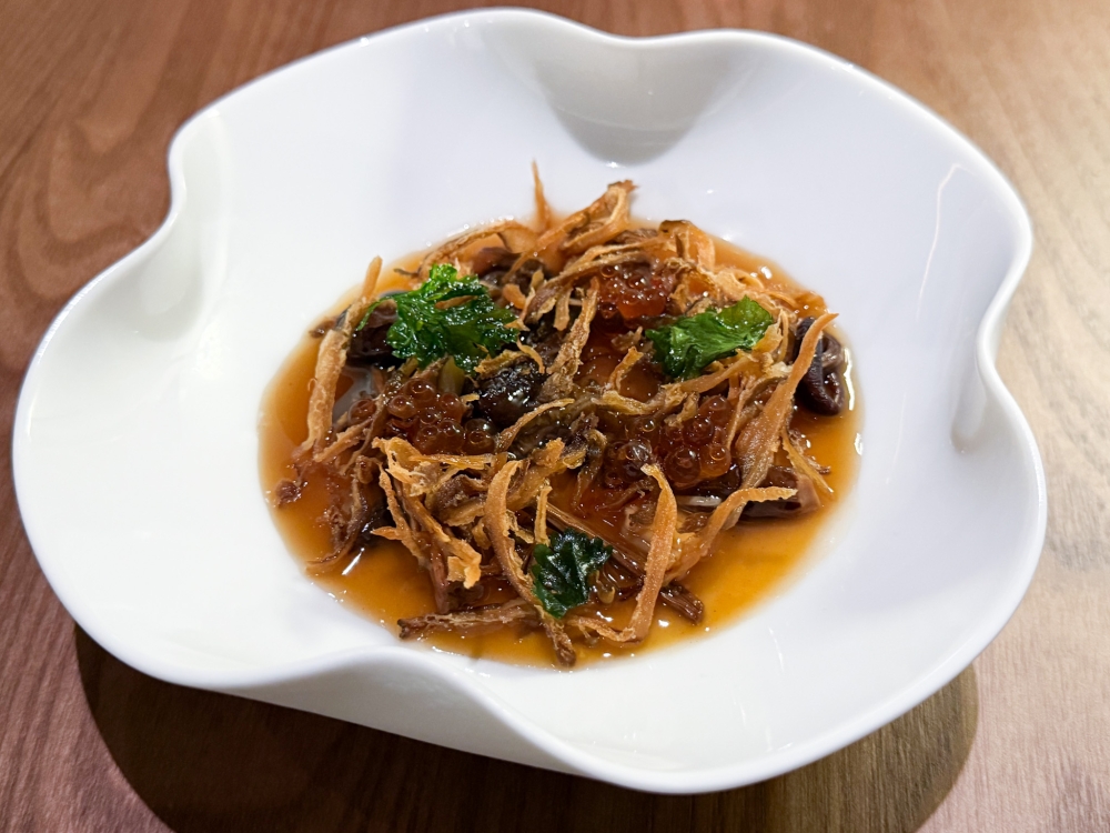 Creamy steamed egg is elevated with five types of mushrooms, dried prawns and scallops plus a sprinkle of ‘ikura’. — Picture by Lee Khang Yi