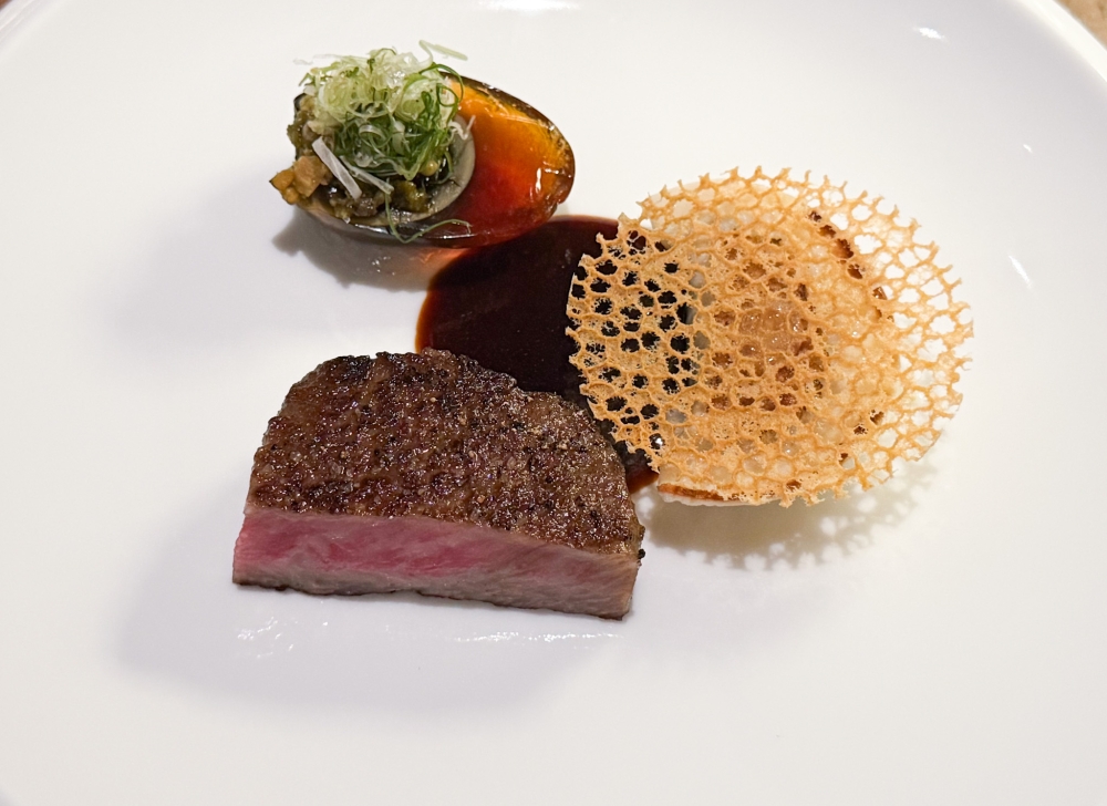You can add extra for the A5 Wagyu accompanied with century egg and a juicy beef dumpling. — Picture by Lee Khang Yi