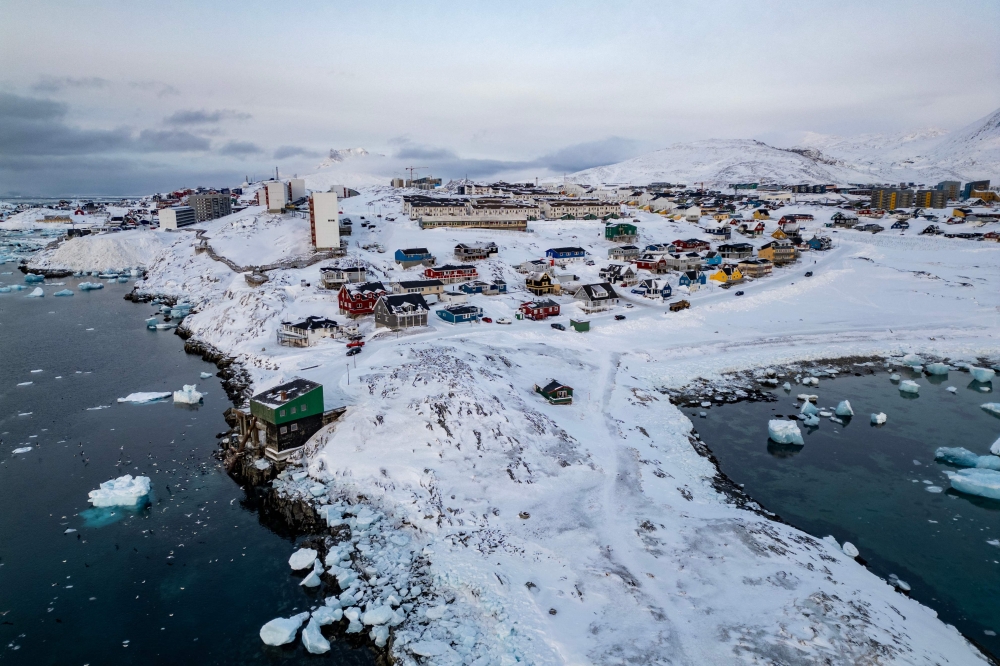Snow-covered buildings in Nuuk, Greenland. The author argues that Greenland’s rare earth riches have ignited a dangerous new phase of great-power rivalry, warning that US ambitions framed as ‘strategic necessity’ risk undermining sovereignty, alliances and trust in an era where resources increasingly drive geopolitics. — AFP pic