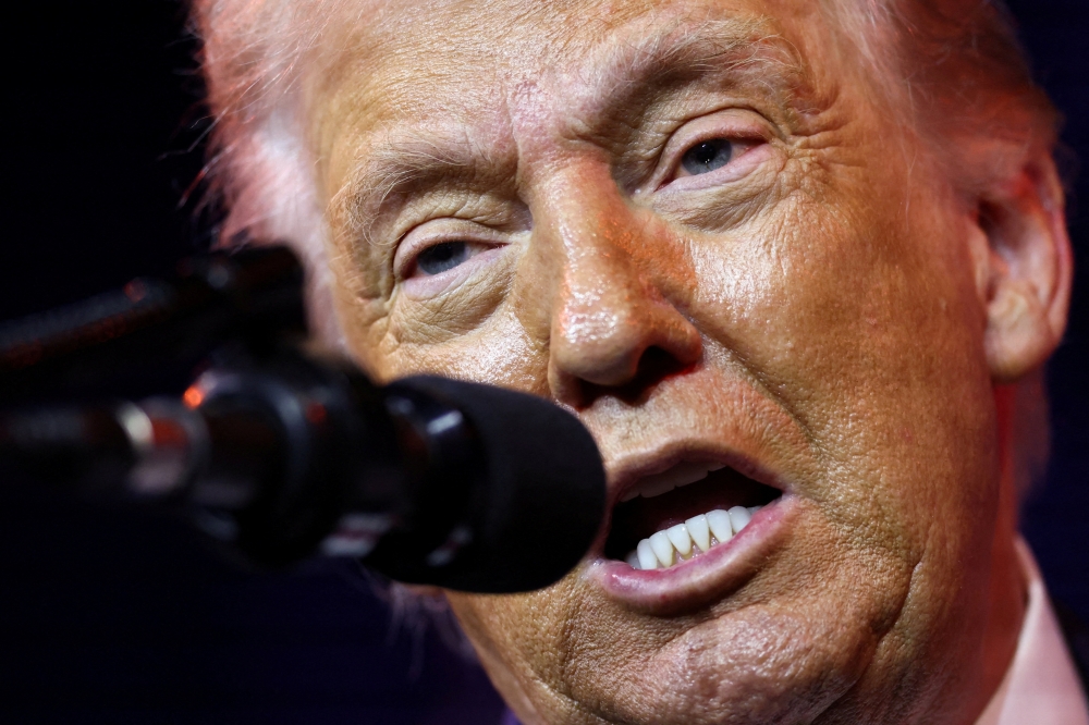 US President Donald Trump said the US and Venezuela were working well together, adding that at least US$100 billion would be invested by the ‘big oil’ companies in Venezuela. — Reuters pic 