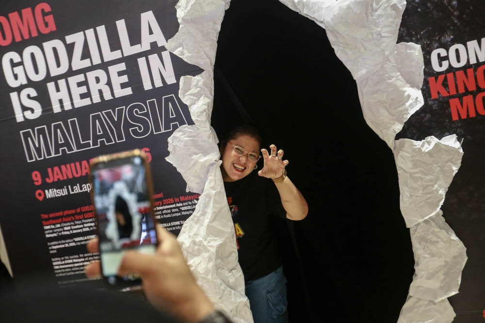 A photo zone was set up at the launch of the Godzilla store in Malaysia, where fans took the opportunity to pose for pictures. — Picture by Sayuti Zainudin