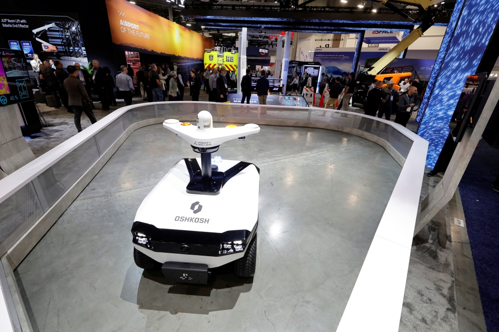 An autonomous, electric airport vehicle with a perimeter security kit is displayed in the Oshkosh booth during CES 2026 in Las Vegas, Nevada on January 7, 2026. — Reuters pic