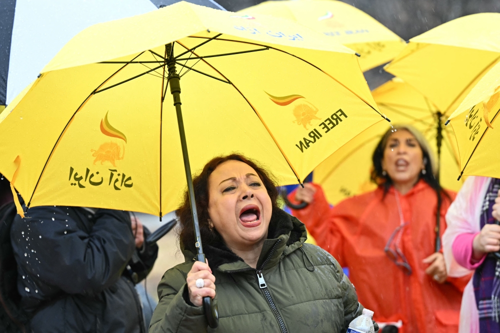Activists take part in a “Free Iran Rally” at Lafayette Square, across from the White House in Washington, DC 