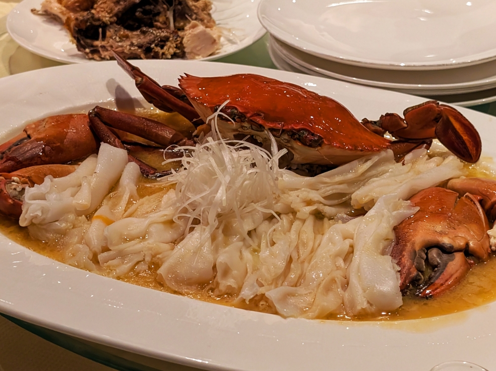 Though its roots lie in Shunde, Guangdong Province, the Crab Steamed with Huadiao, Chicken Oil & Chencun Rice Noodles has also entered the canon of Hong Kong dishes in most refined restaurants. — Picture by Ethan Lau