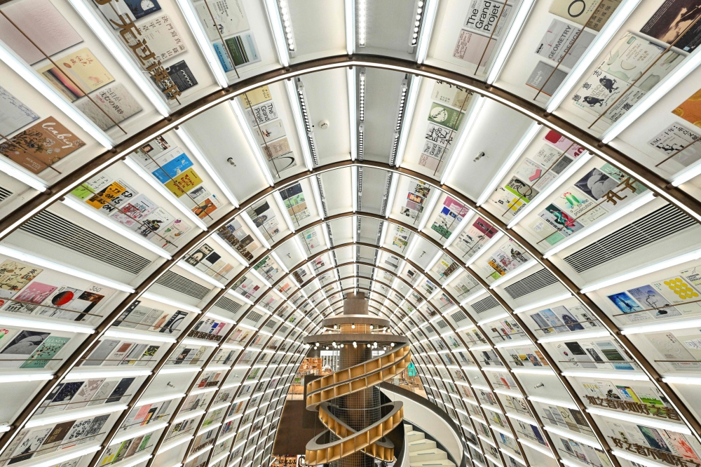 Some bookstores in China now invest in creating interiors meant to be photographed. — AFP pic