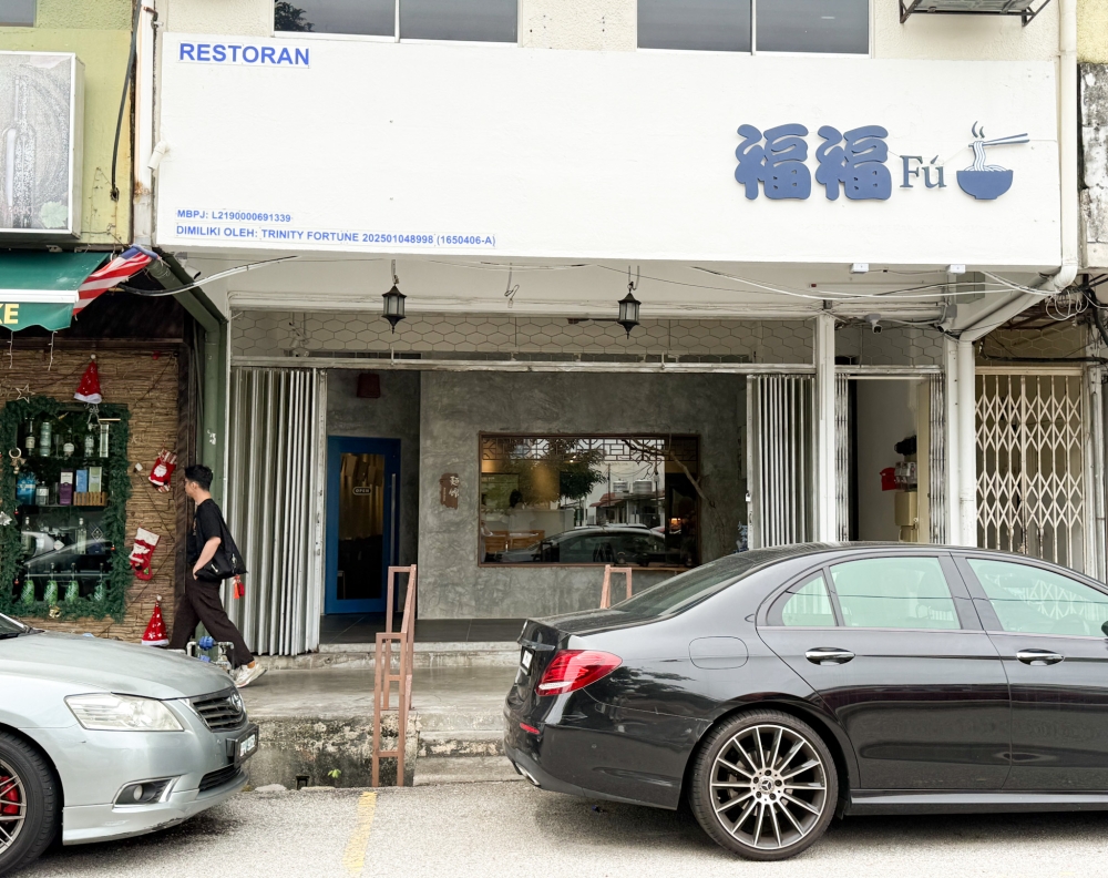 The restaurant sits between a 'bak kut teh' and two corner coffee shops. — Picture by Lee Khang Yi