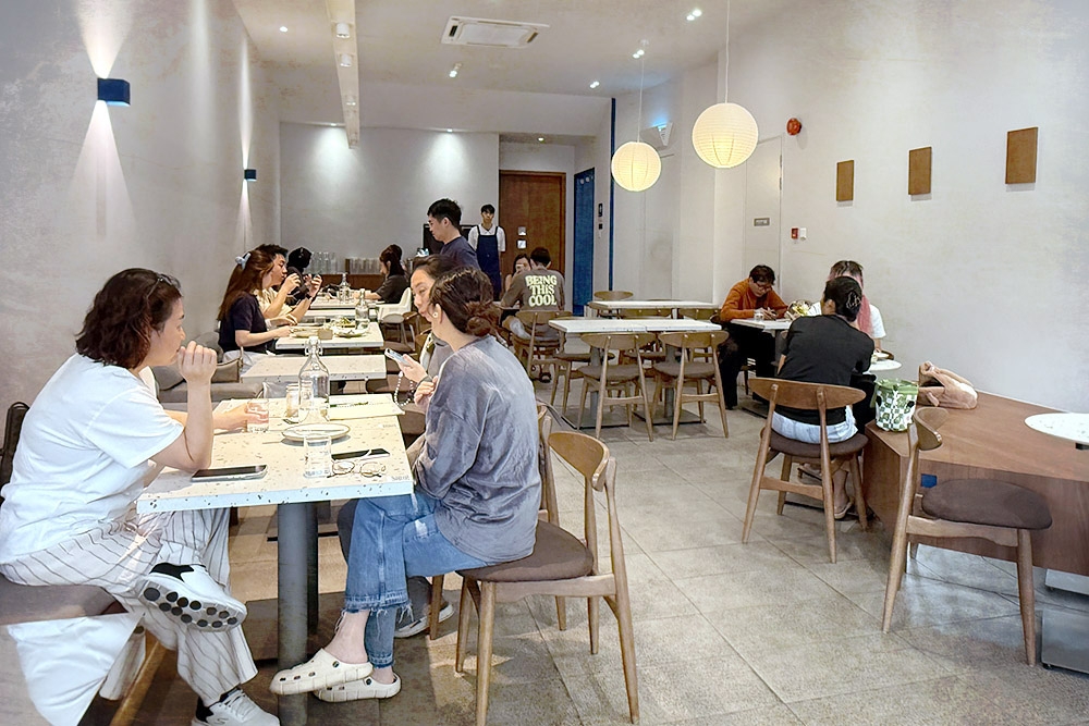 The minimalist interior of NOff Coffee. — Picture by CK Lim