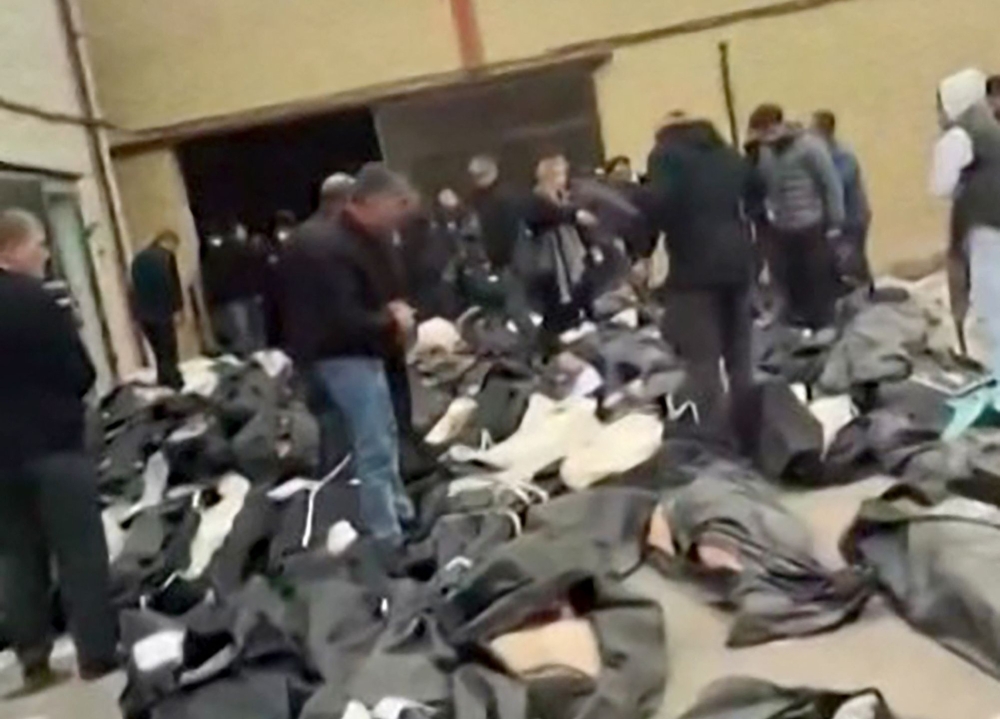 Rights group says 648 killed in Iran protest as government stages mass rallies