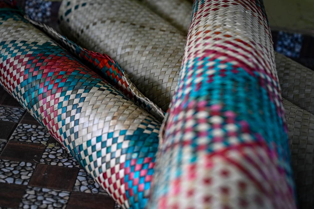 Each mengkuang mat is sold for between RM60 and RM70. — Bernama pic
